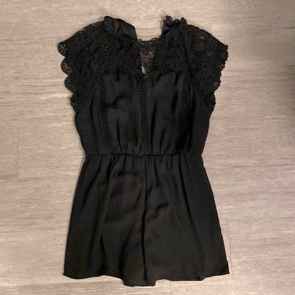 Black. Zip up romper